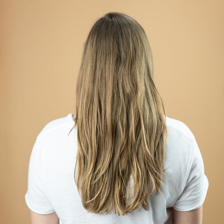 Before Travel Volumizing Mist usage from back view