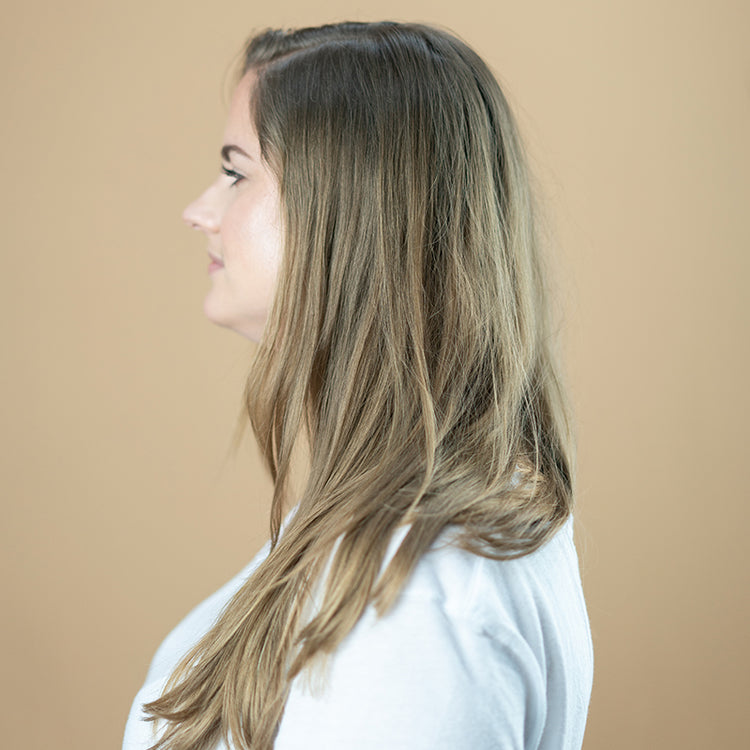 Before Travel Volumizing Mist usage from side view